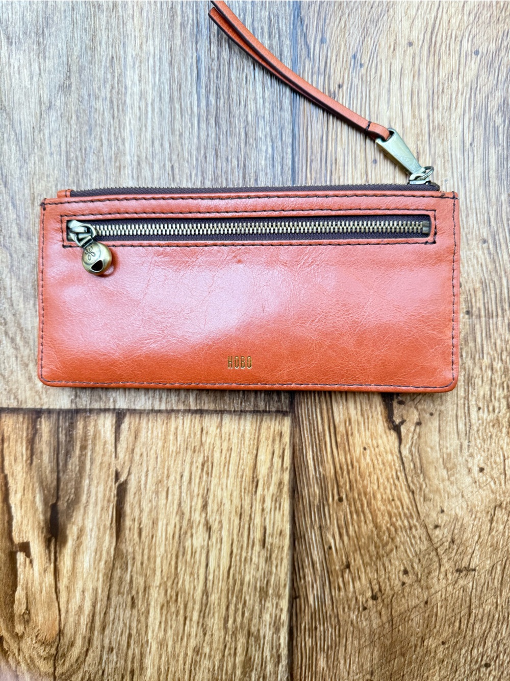 HOBO Caramel Orange Leather Wristlet Wallet Slide Clutch Graphic Floral Lining